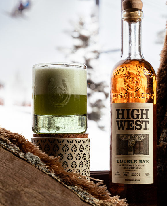 The Eagle's Nest High West Cocktail next to a bottle of Double Rye.
